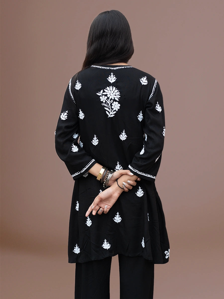 Elegant white thread embroidered kurti set in flowy silhouette
