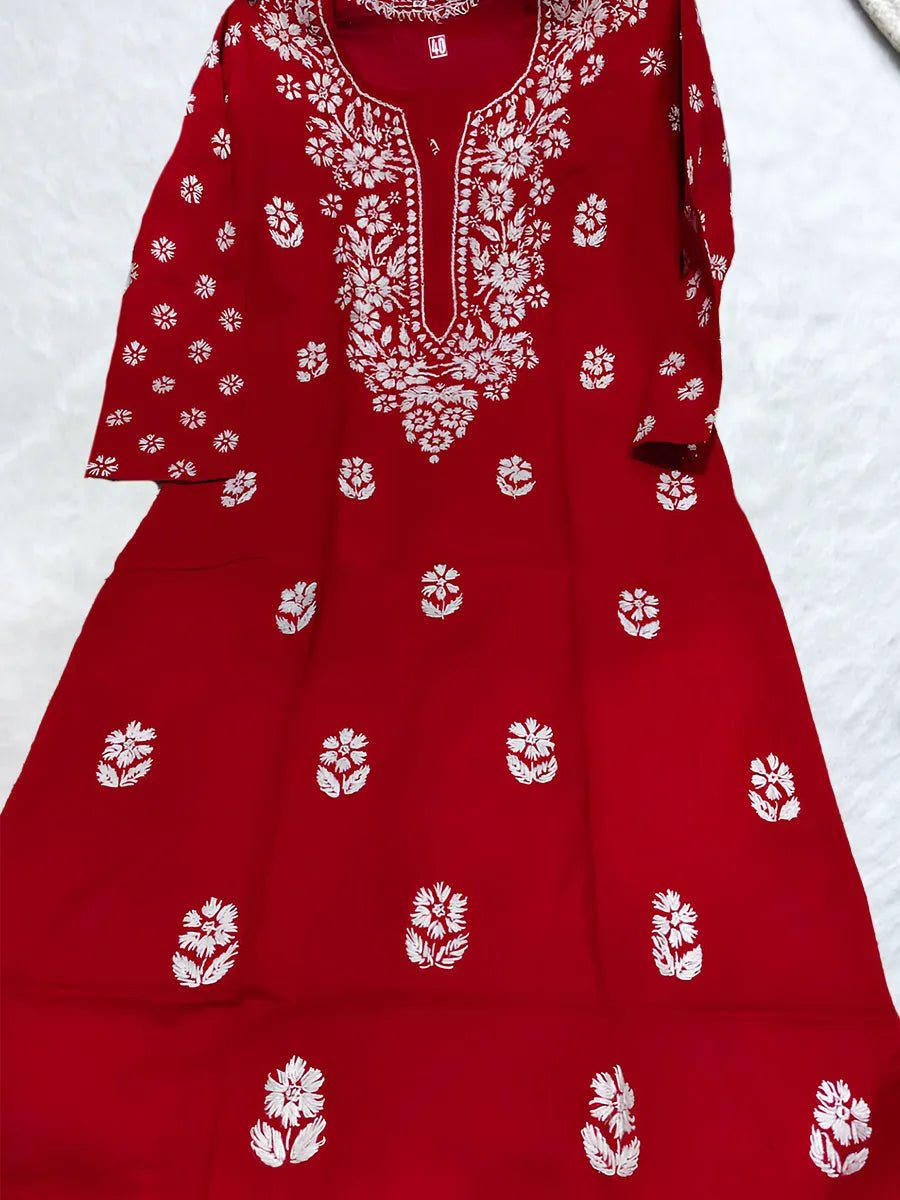 Festive crimson kurti featuring white hand embroidery on neck and sleeves