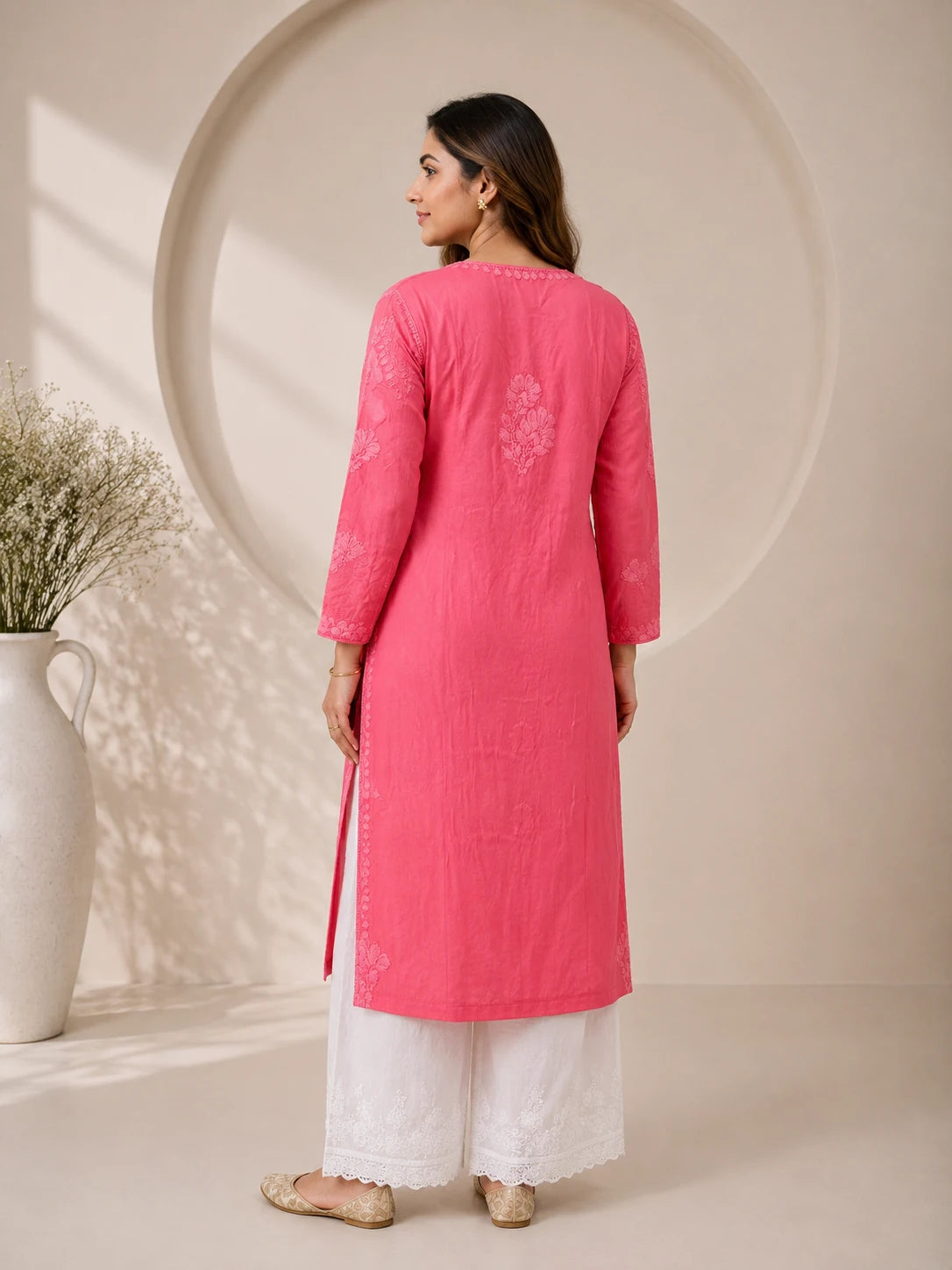 Full-length women's straight chikankari kurti with embroidered sleeves