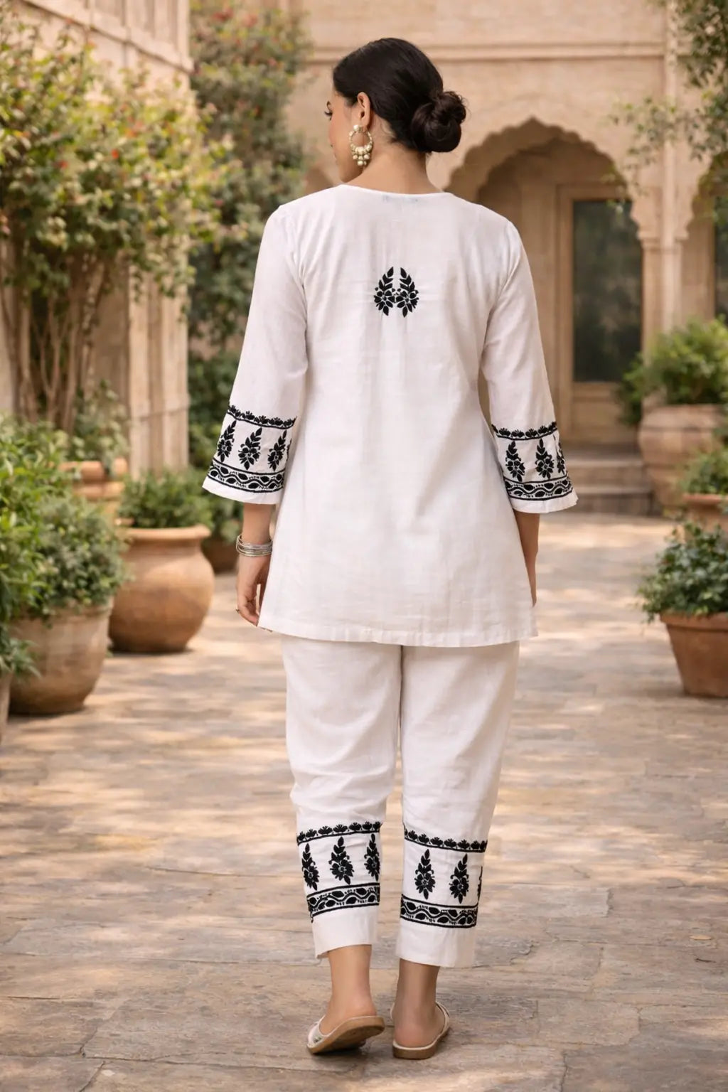 Women’s white chikankari co-ord set in premium soft rayon with black embroidered kurti and matching pants