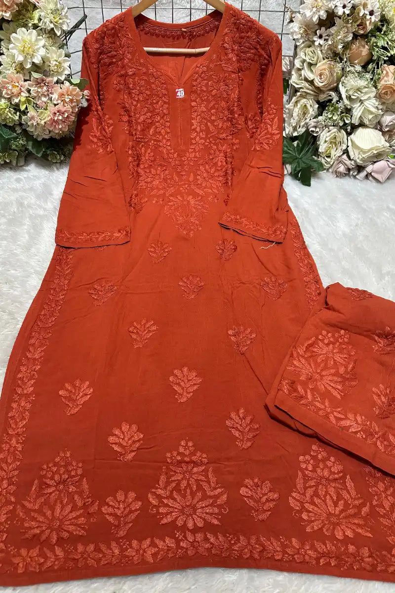 Burnt orange rayon fancy work kurti with all-over 3 boota pattern and border