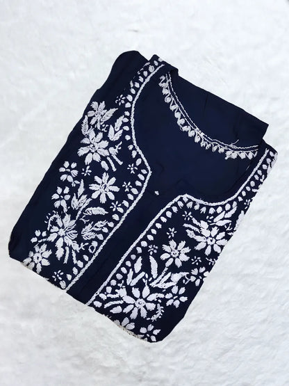 Classic navy blue chikankari kurti with white floral hand embroidery on front panel

