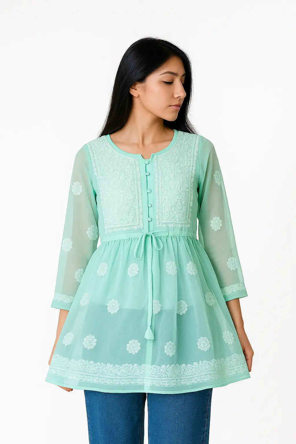 "Elegant Indian model wearing a mint green Chikankari kurti with delicate embroidery"

