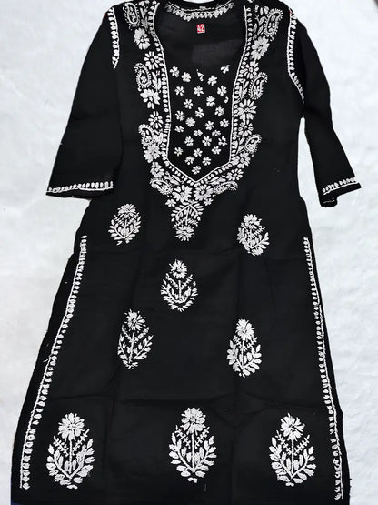 Elegant black cotton kurti with intricate white chikankari embroidery on neckline and sleeves