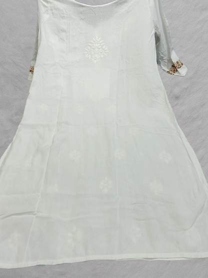 Ethnic wear set with subtle floral detailing on bottom and sleeve borders