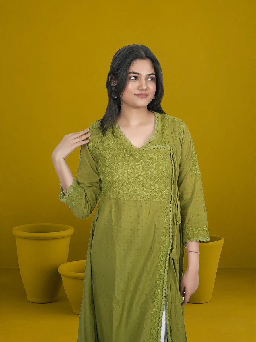 Beautiful green Chikankari Angrakha kurti displayed on mannequin – traditional Indian wear

