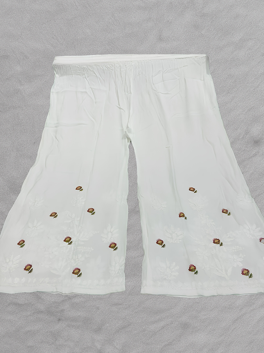 Light festive plazo set featuring border floral prints and Ancor-style print finish

