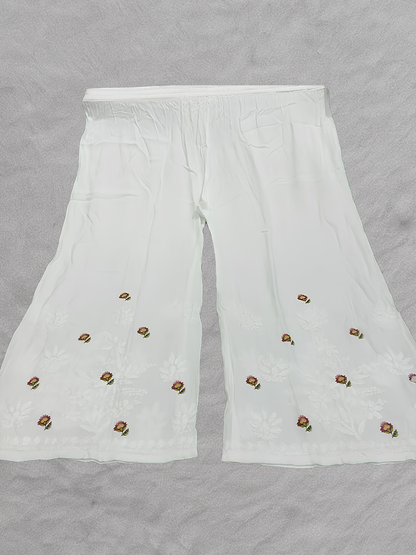 Light festive plazo set featuring border floral prints and Ancor-style print finish

