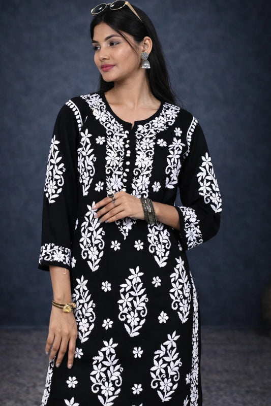 Modal chikankari plazo set featuring heavy big buta embroidery on kurti with elegant ethnic detailing