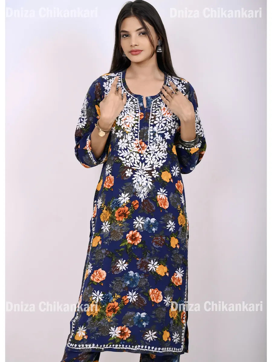 Navy blue floral printed chikankari kurti set with white hand embroidery, 3/4 sleeves, and round neckline – festive ethnic wear for women