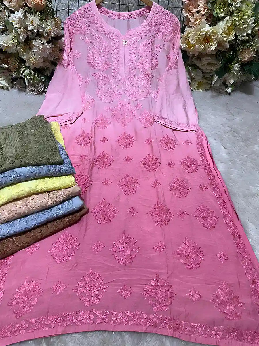 Pink gradient masleen kurti with fancy floral embroidery on neckline and hem.

