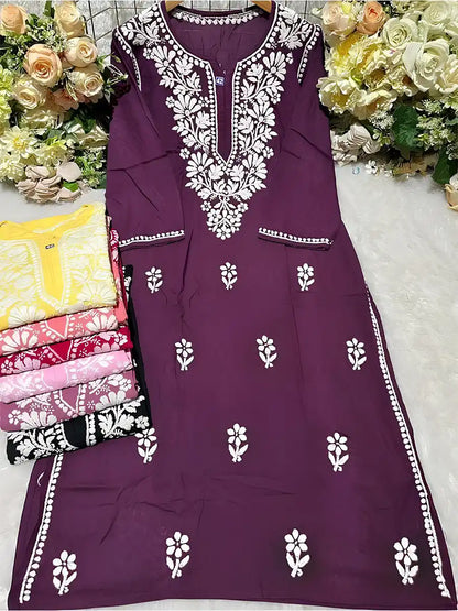 Rich plum purple rayon kurti with contrast white gala booti Chikankari embroidery adding a bold ethnic flair.