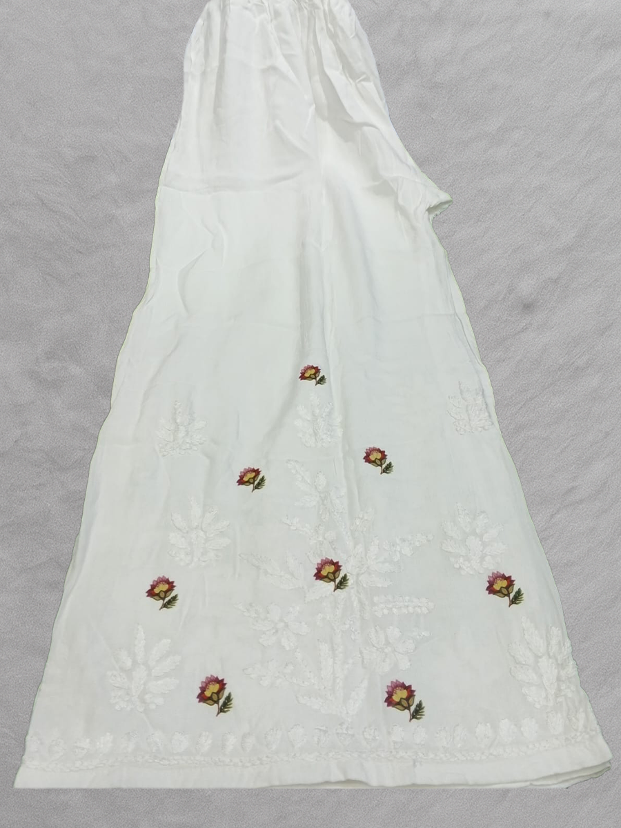 Soft printed reyon fabric outfit with floral work along kurti hem

