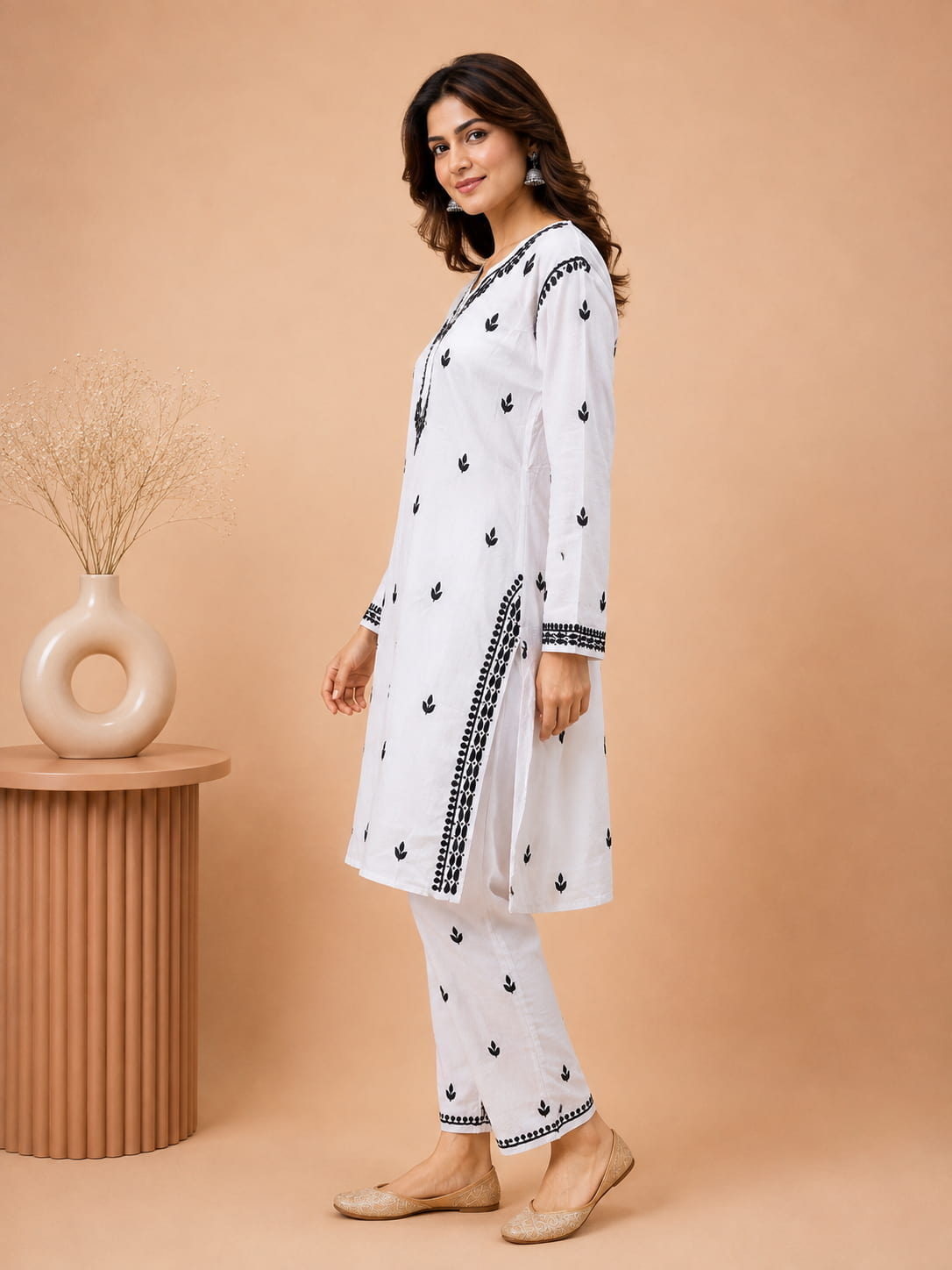 White and black embroidered rayon ethnic set by Dniza Chikankari