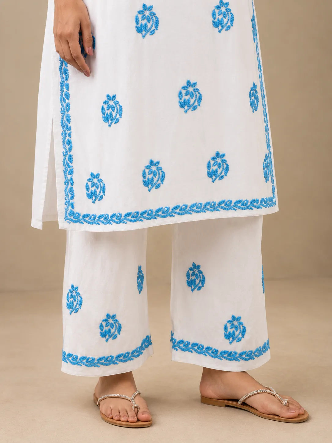 White rayon kurta with sky blue chikankari style embroidery and matching palazzo