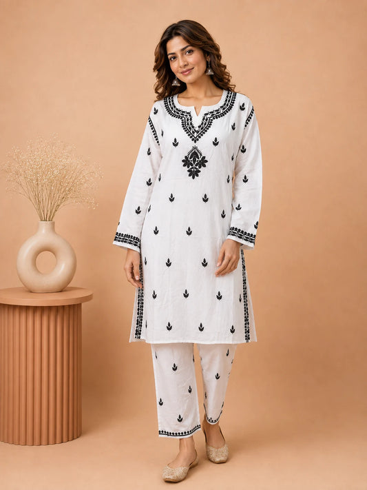 Women’s white rayon kurta with black floral embroidery and matching pant