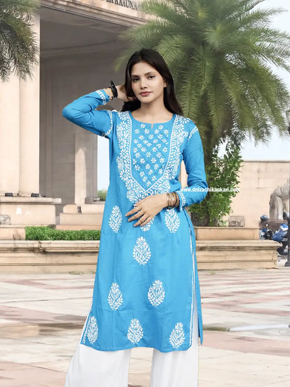 cotton chikankari kurti with intricate gala booti and sleeve embroidery, crafted in breathable sport cotton with Ancor white thread.